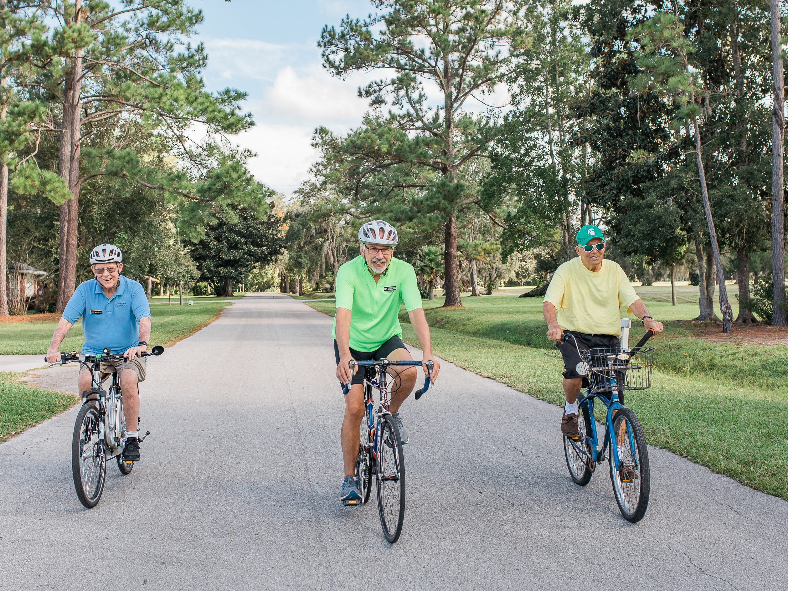 Residents riding bicycles on streets of Penney Retirement