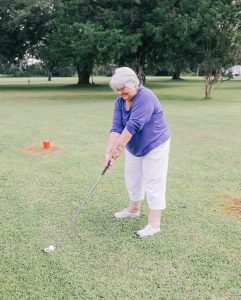 Residents playing golf at Penney Retirement Community