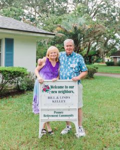 New couple in front of their home at Penney Retirement Community 