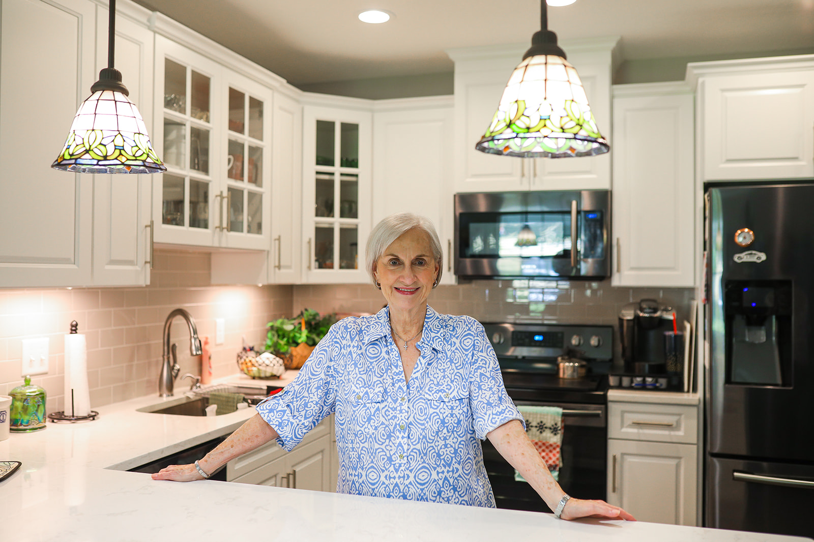 Resident in her kitchen at Penney Retirement Community
